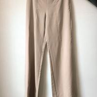 Pantaloni eleganti con logo dorato
