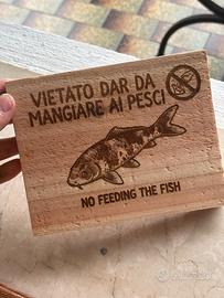 Cartelli targhe e foto  incise al laser