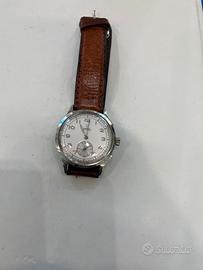 Omega carica manuale