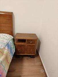 Letti singoli e comodini