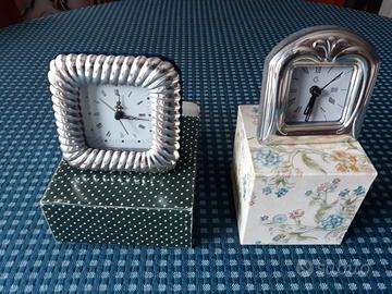 due orologi in argento