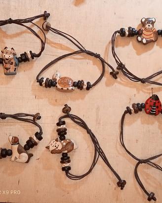 BRACCIALETTO CON ANIMALE IN LEGNO CORDINO REGOLABI