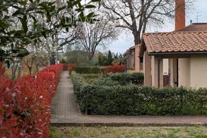 Appartamento con giardino e piscina condominiale