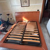 Letto contenitore in ciliegio matrimoniale