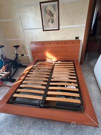 Letto contenitore in ciliegio matrimoniale