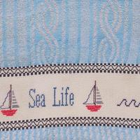 asciugamano ricamato a mano 