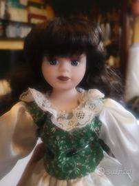 bambola porcellana 40 cm. capelli foltissimi 