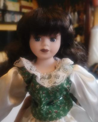 bambola porcellana 40 cm. capelli foltissimi 