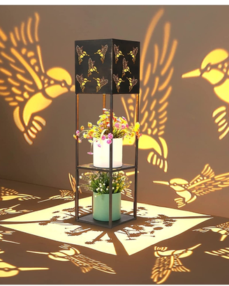 2 luci solari con ripiani per piante