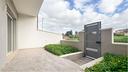 villa-a-schiera-con-cortile-fronte-e-retro