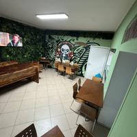 Pizzeria da asporto con posti a sedere