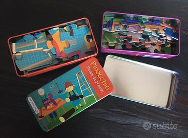 Due puzzle “The purple cow”  in scatolette metallo