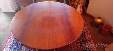 Tavolo tondo in legno con prolunghe e 6 sedie