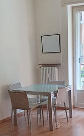 TAVOLO DI CRISTALLO  ALLUNGABILE CON SEDIE