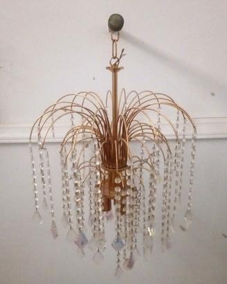Lampadario in ottone e cristalli. Vintage