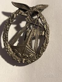 Spilla simbolo marina