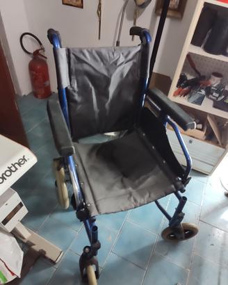 Sedia a rotelle, carrozzina pieghevole 