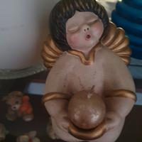 Angelo thun con candela