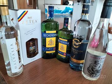 bottiglie distillati liquori, vodka beluga, grappe