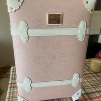 Valigia trolley a mano rosa e bianco con fiori