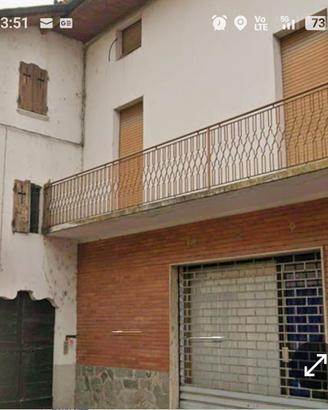 Casa con giardino