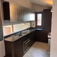 Arredamento mobili  cucina specchio divano pelle