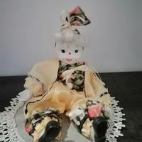 Pagliaccio in ceramica e porcellana.