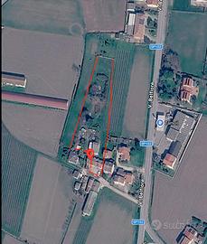 Casa con terreno e capannone
