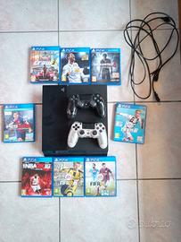 PlayStation 4 con giochi e 1 pad