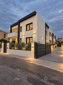 Ampio trilocale con giardino di 154 mq