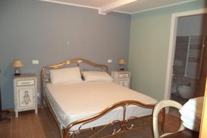 Stanza con bagno privato e cucina in comune