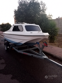 Barca con carrello e motore