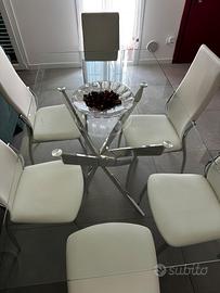 Sedie e tavolo vetro