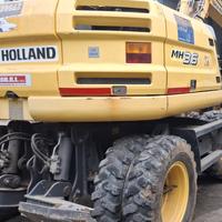 Escavatore New Holland