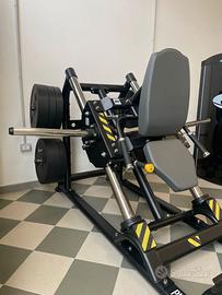 pressa hack squat a carico pesi manuale