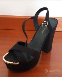 décolleté nere scamosciate tacco 12 con plateau