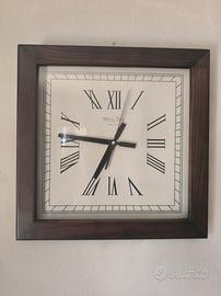 Orologio in legno da parete