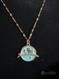 Collana con ciondolo gatto celeste dorato