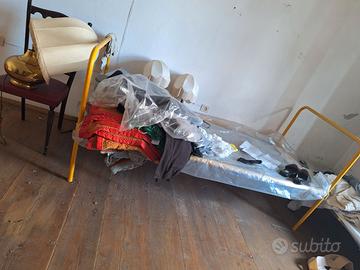 Brandina letto con banda letto in ferro battuto
