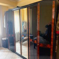 Armadio letto comó comodini