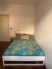 Camera matrimoniale arredata appartamento cento