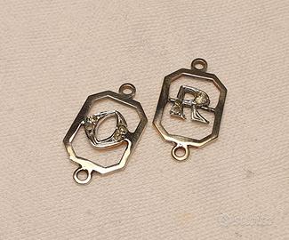 Medaglie in argento 925 placcato oro e brillanti 