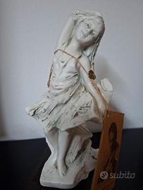 scultura giovane donna danzante