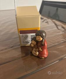 Thun presepe bimbi che magiano pane