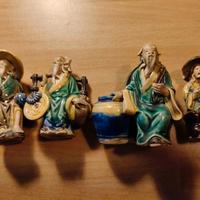 Set 4 statuette vintage in terracotta smaltata