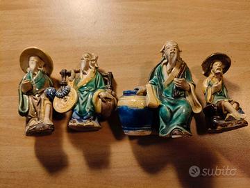 Set 4 statuette vintage in terracotta smaltata