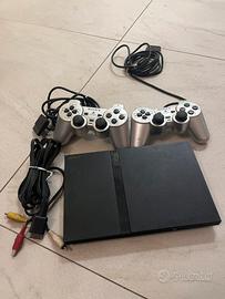 Playstation 2 Slim e giochi