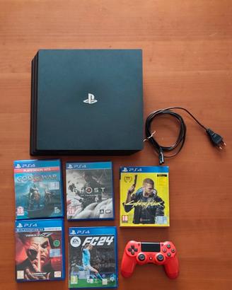 PlayStation 4 Pro  con controller e giochi