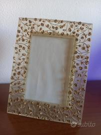 cornice portaritratto