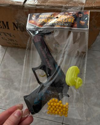 Pistola finta con palline